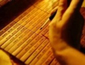 古人写字为什么从右边开始而且还竖着写?