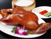 北京烤鸭是谁发明的美食？